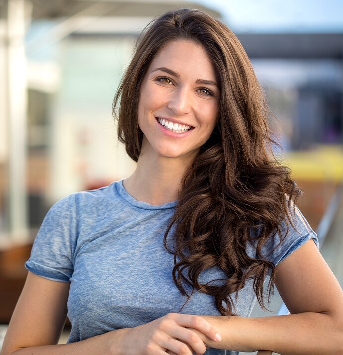 Woman smiling outdoors